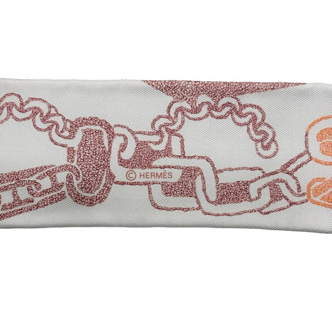 【新品未使用】 Hermes エルメス TWILLY ツイリー 《ブックル・エ・マイヨン》 小物 グレージュ / ブリック / オレンジ シルク100％ 新品未使用